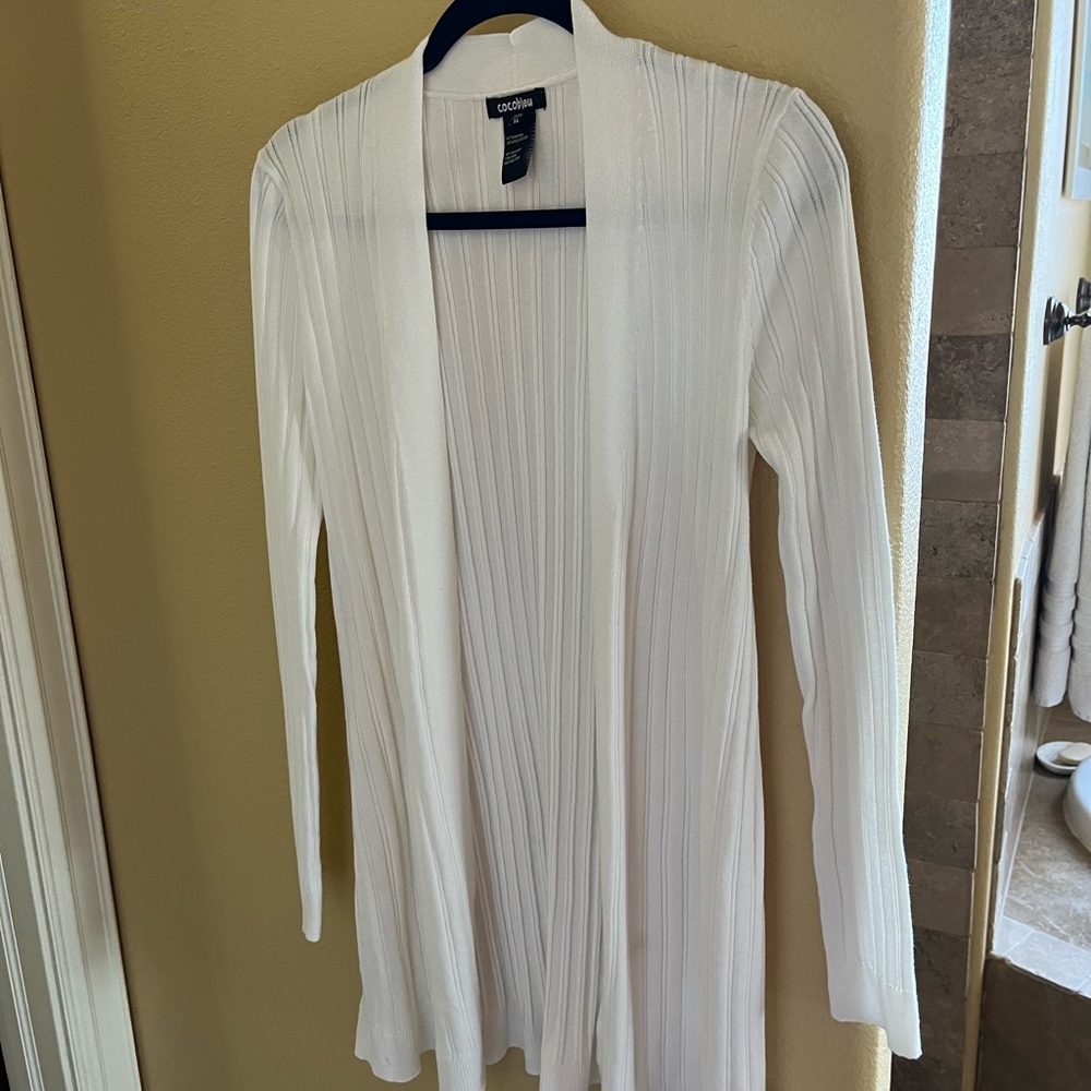 Women’s white cardigan with slits on the side